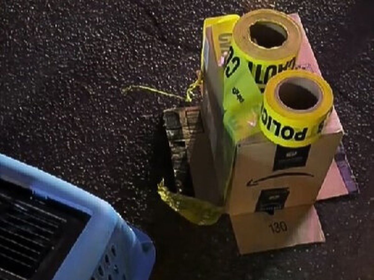 cardboard box and police tape