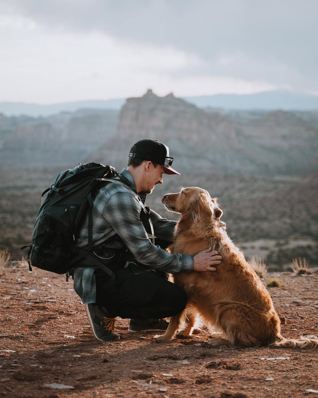man and Golden Retriever