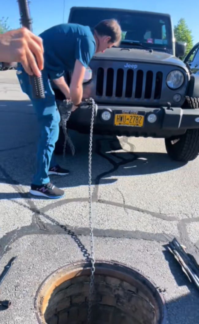 man and opened sewer