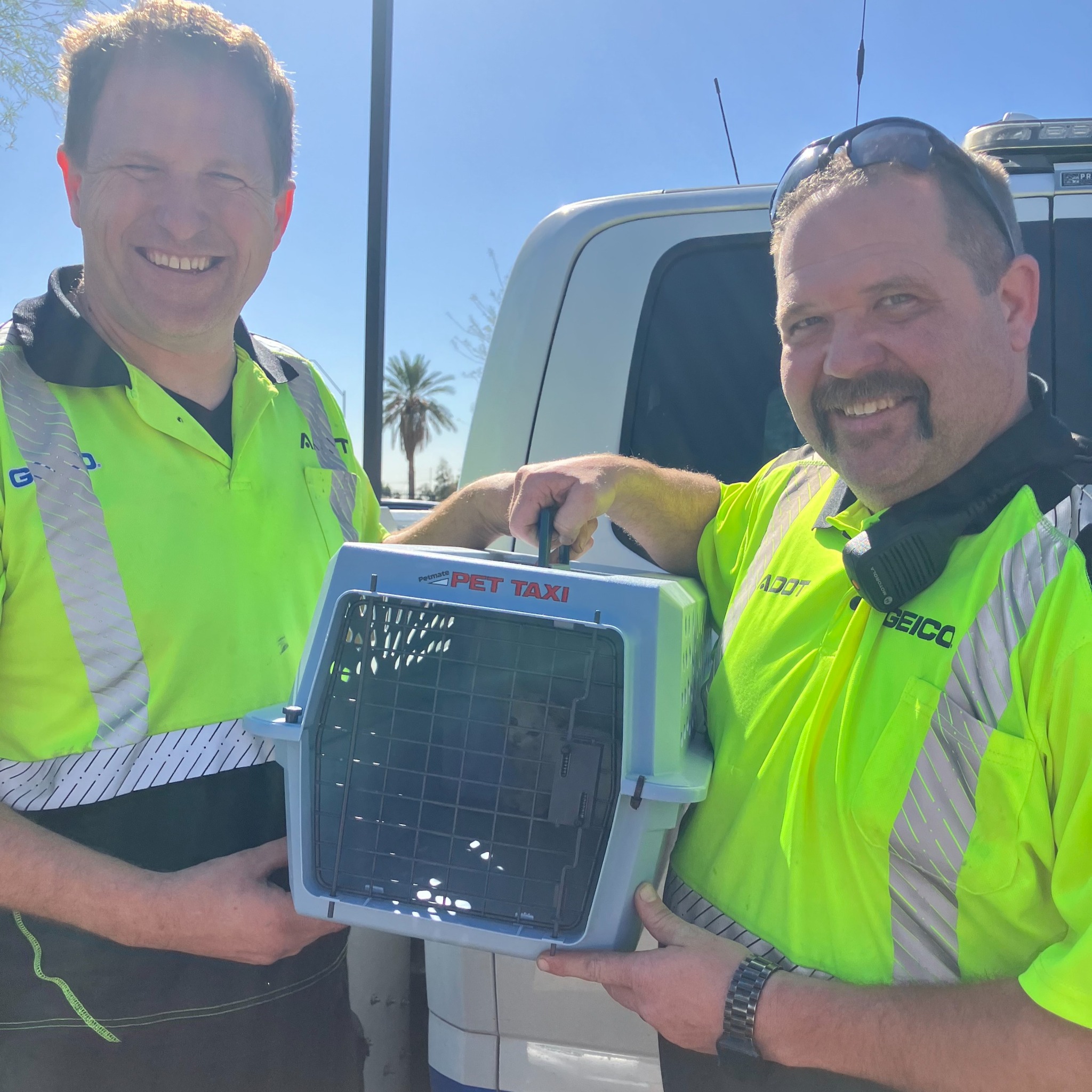 rescuers and tiny kitten