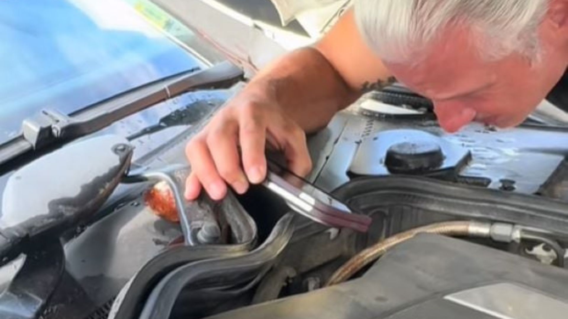 mechanic checking a car