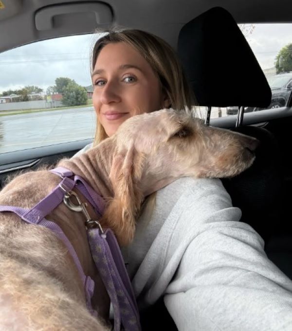 blonde woman and dog