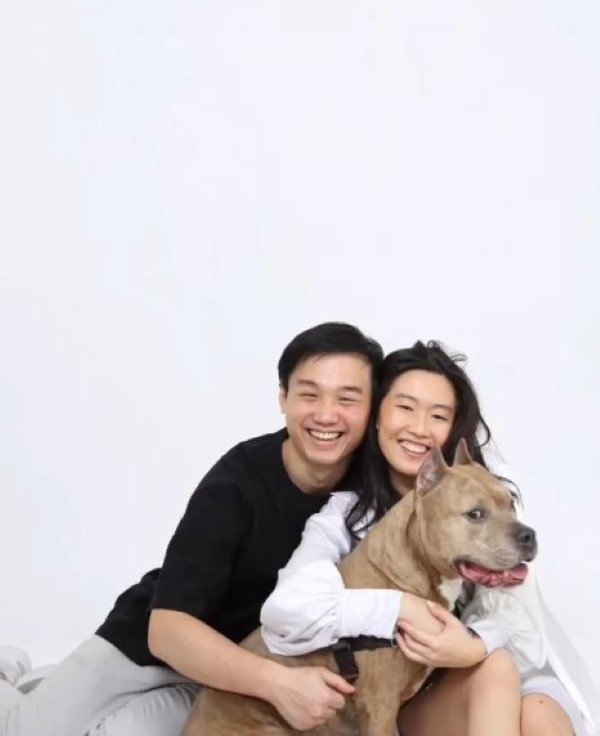 couple and dog