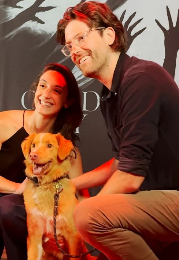 couple and happy dog