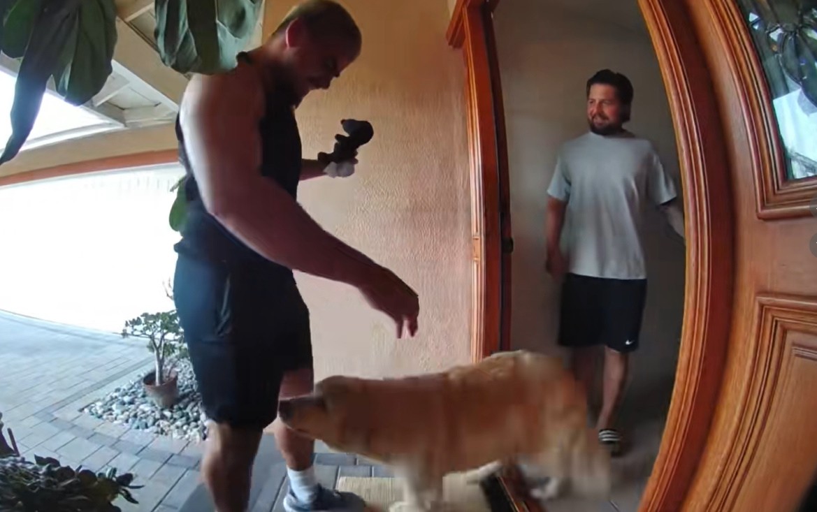 dog and men on porch