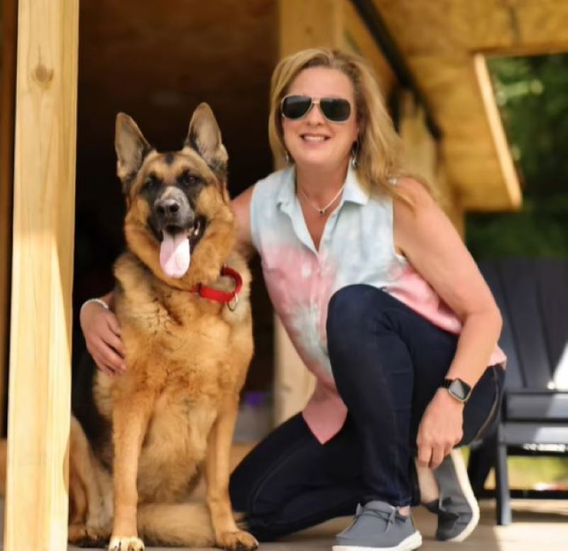 woman and German Shepherd
