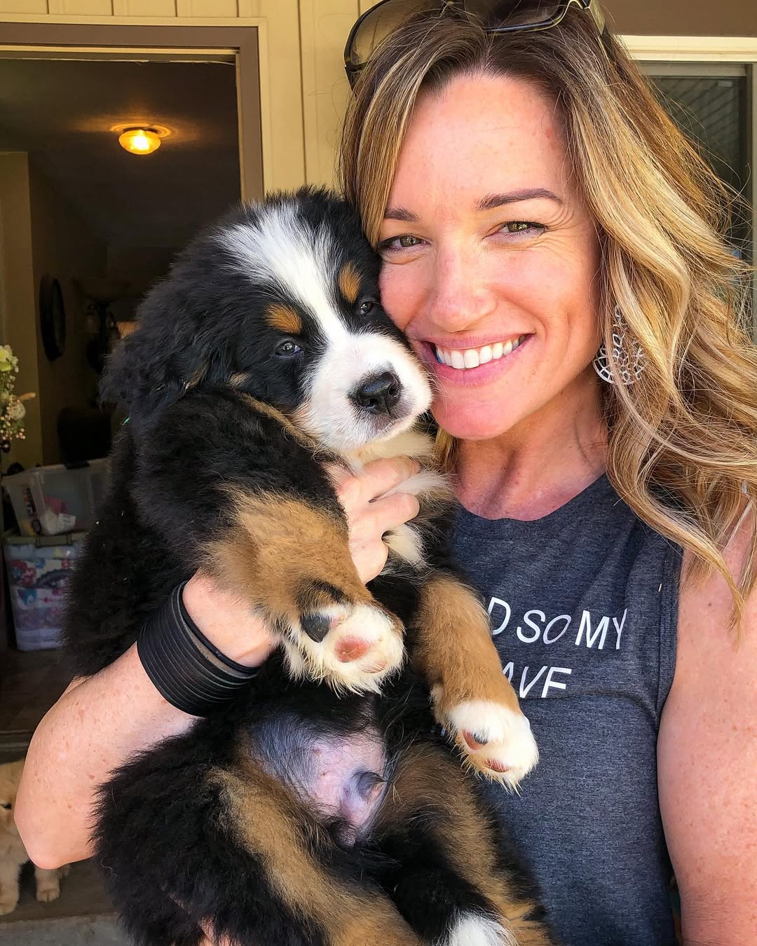 woman holding a sweet dog
