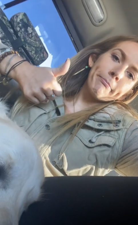 woman with thumbs up