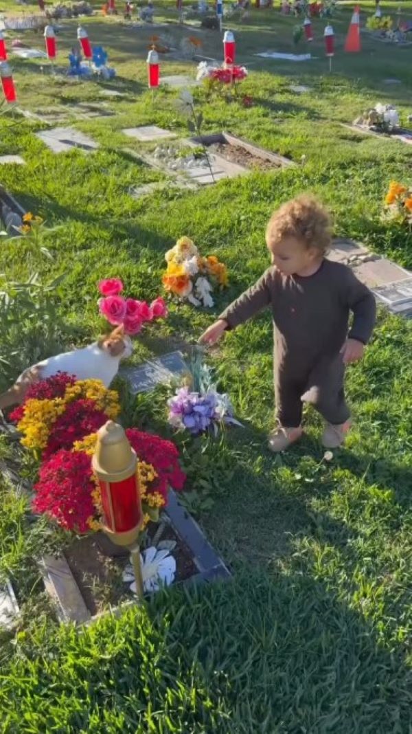 kid on grave
