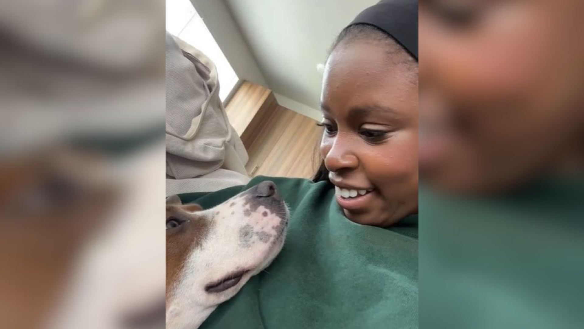 woman and dog cuddling