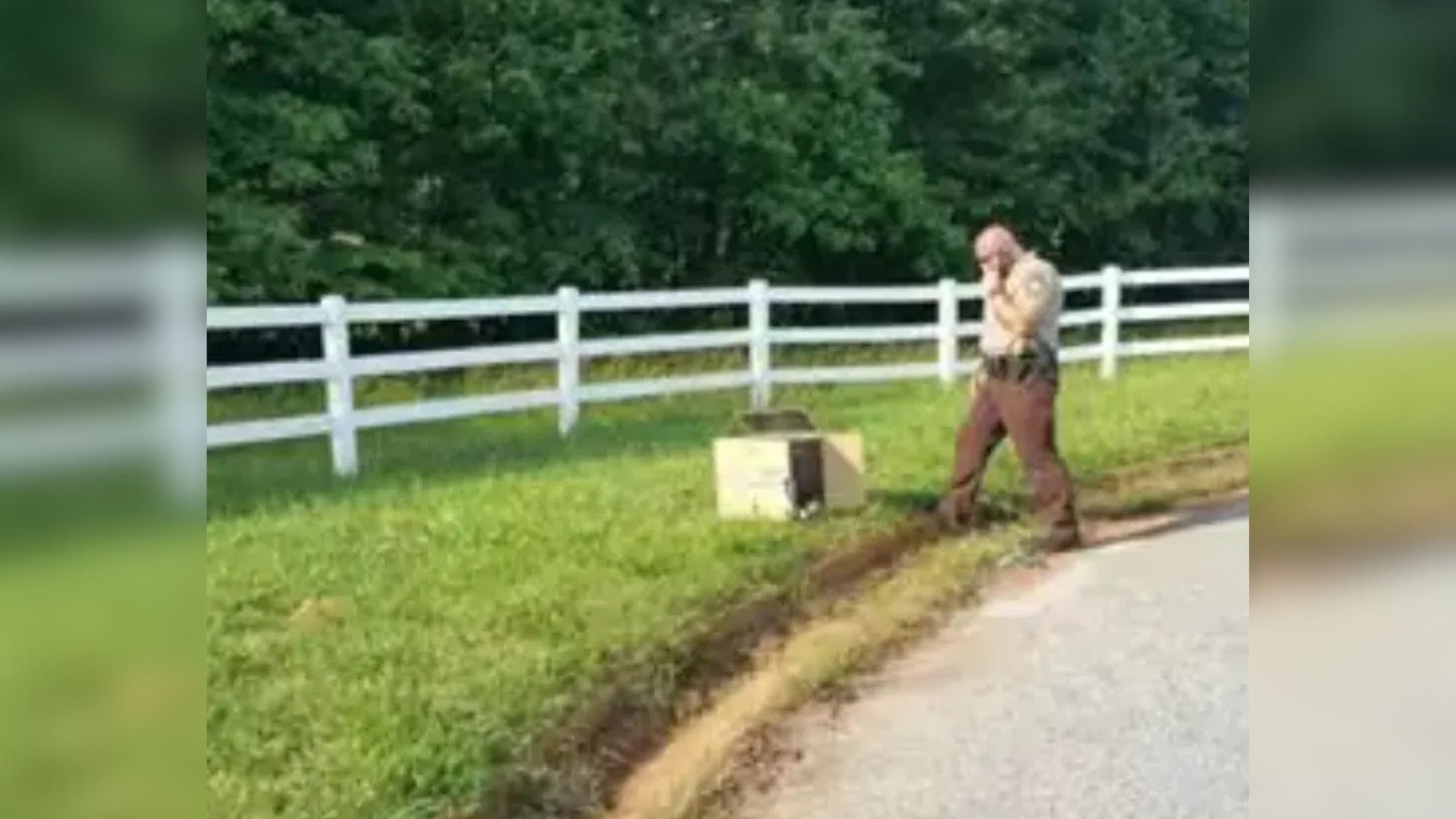officer and cardboard box
