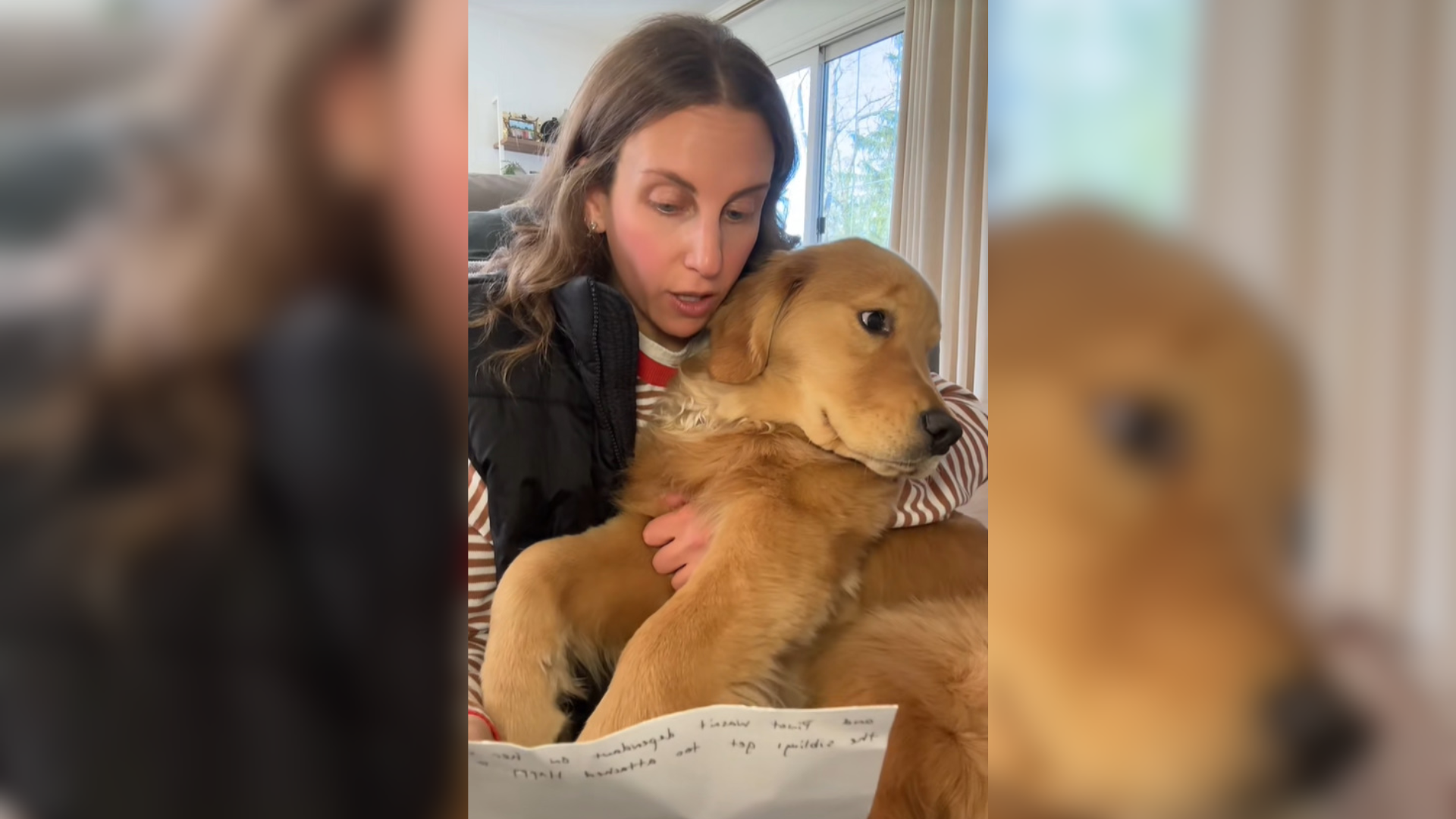 woman reading to dog