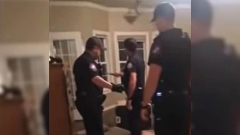 police officers in house