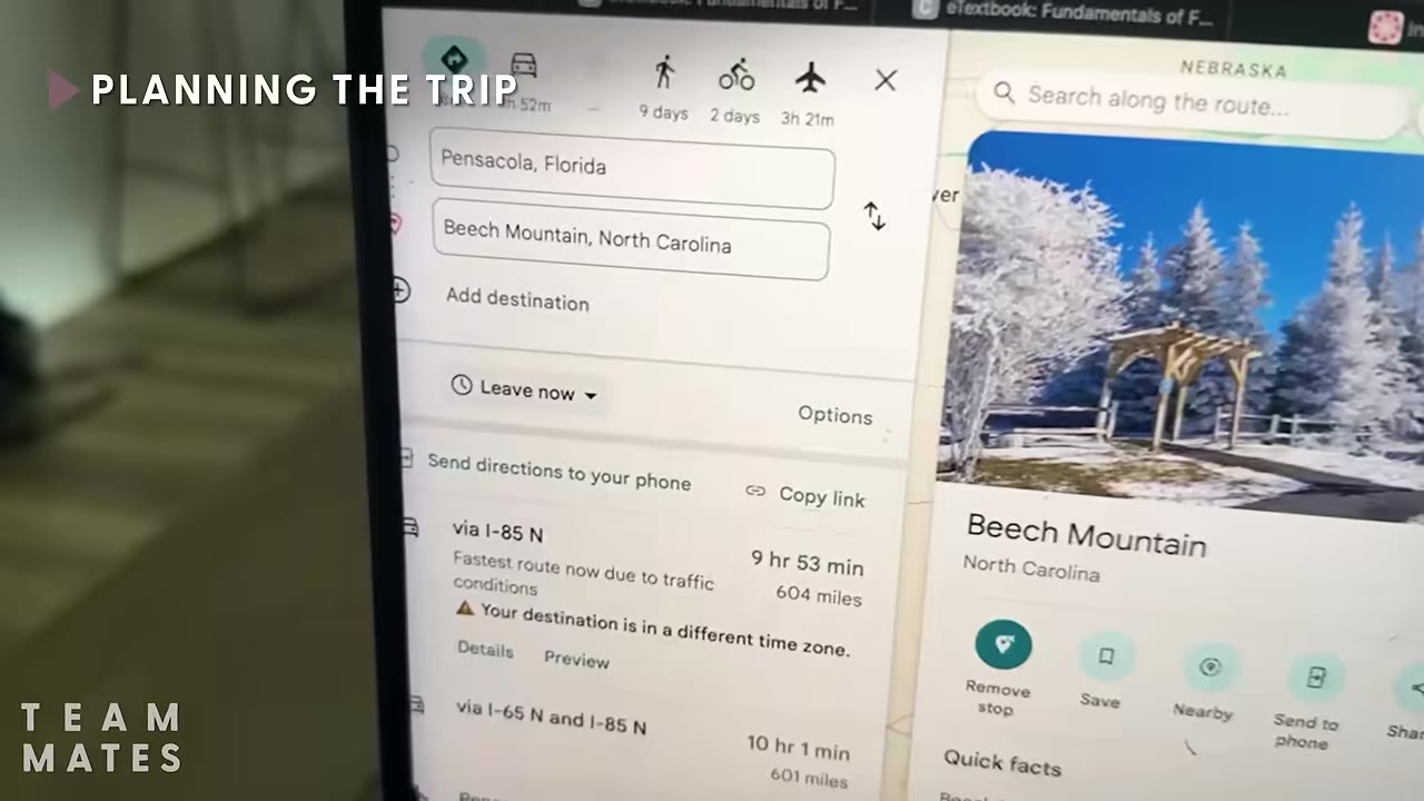 A close-up of a computer screen showing a map route being planned from Pensacola, Florida to Beech Mountain, North Carolina, with a photo of a snowy landscape on the side.